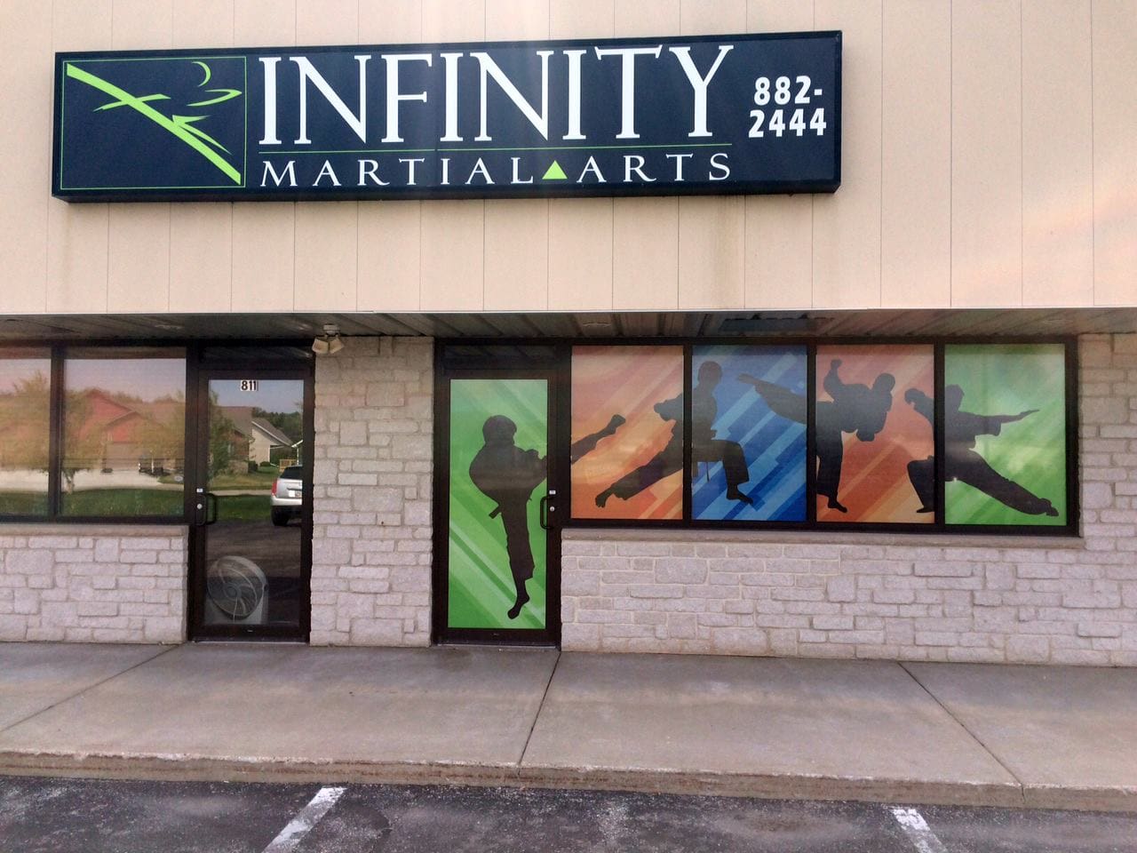 Infinity martial arts banner on window