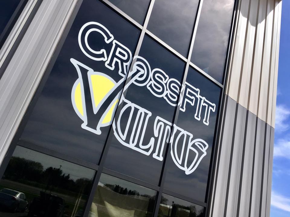 Graphics banner on glass for fitness club