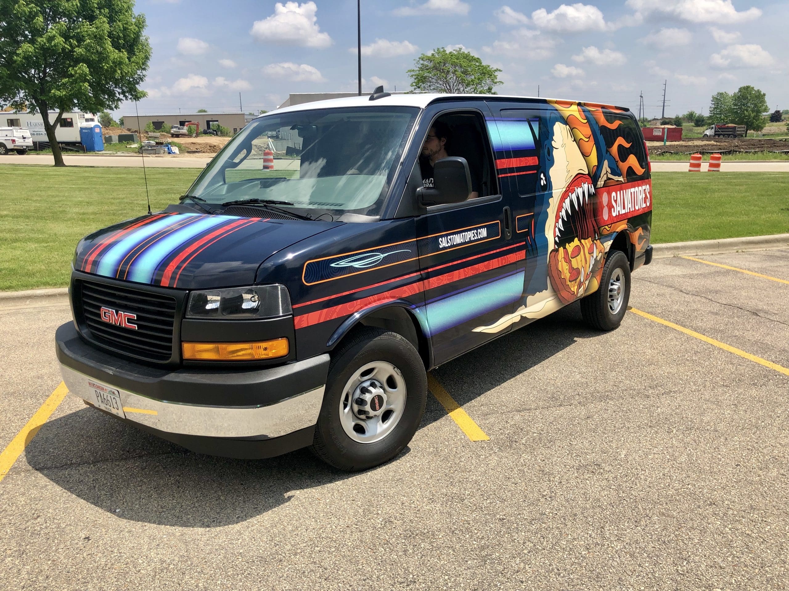 Madison Graphics Banner on a car