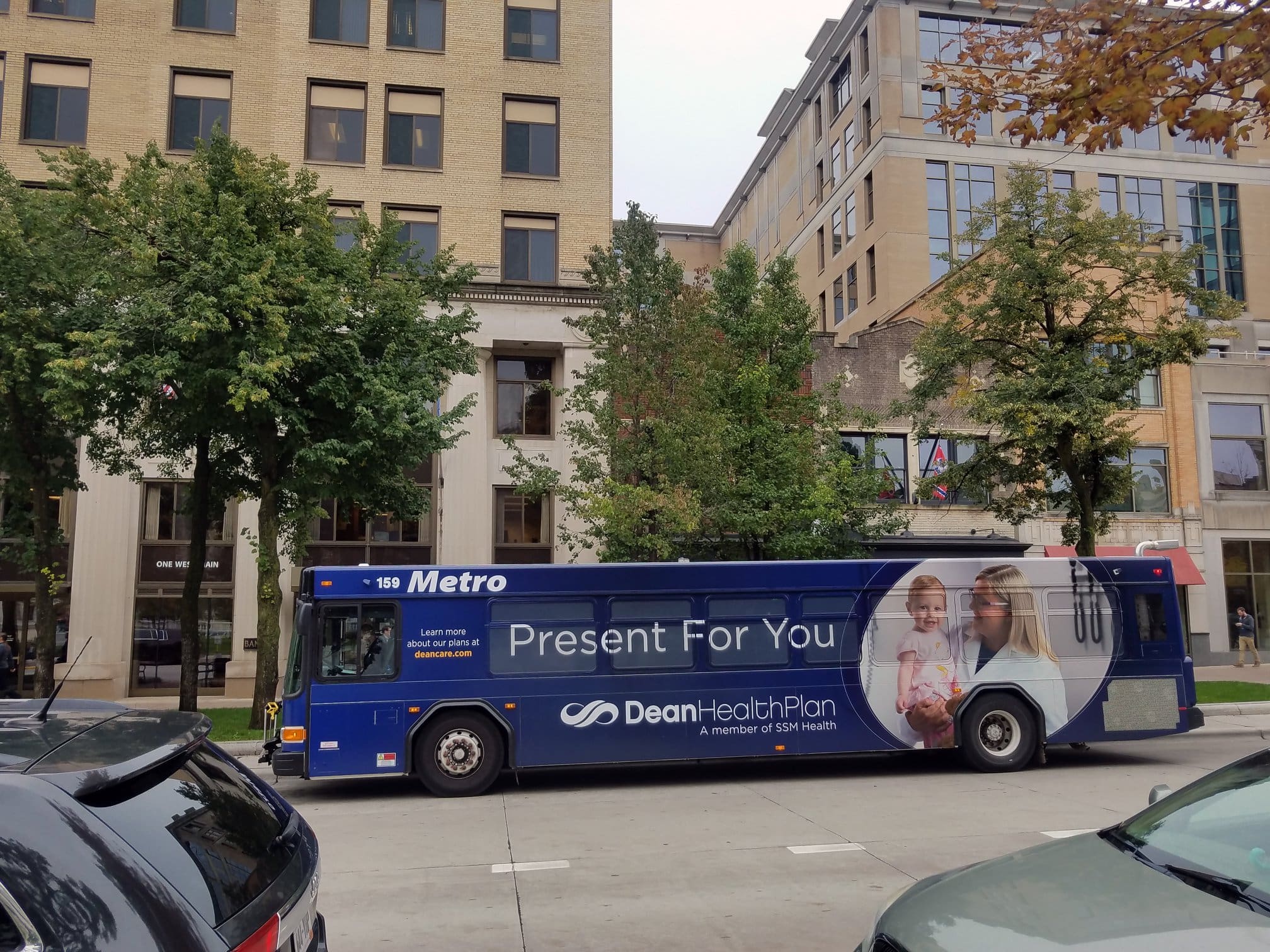 Dean Health plan Bus Fleet Graphics promoting their business on the metro bus