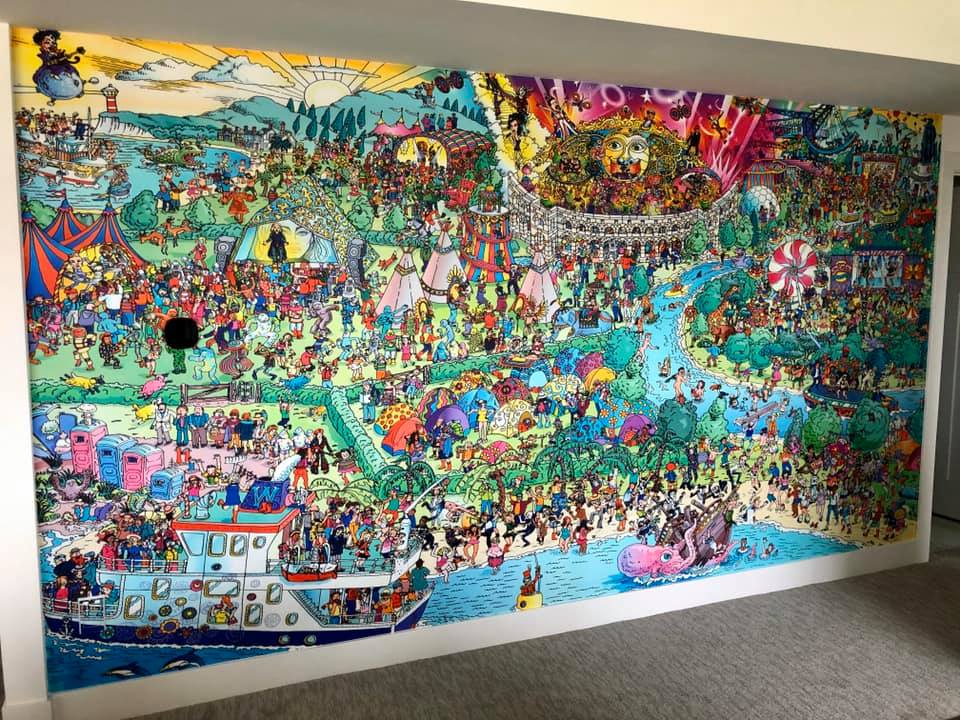 Where's waldo style wall mural in a residential room