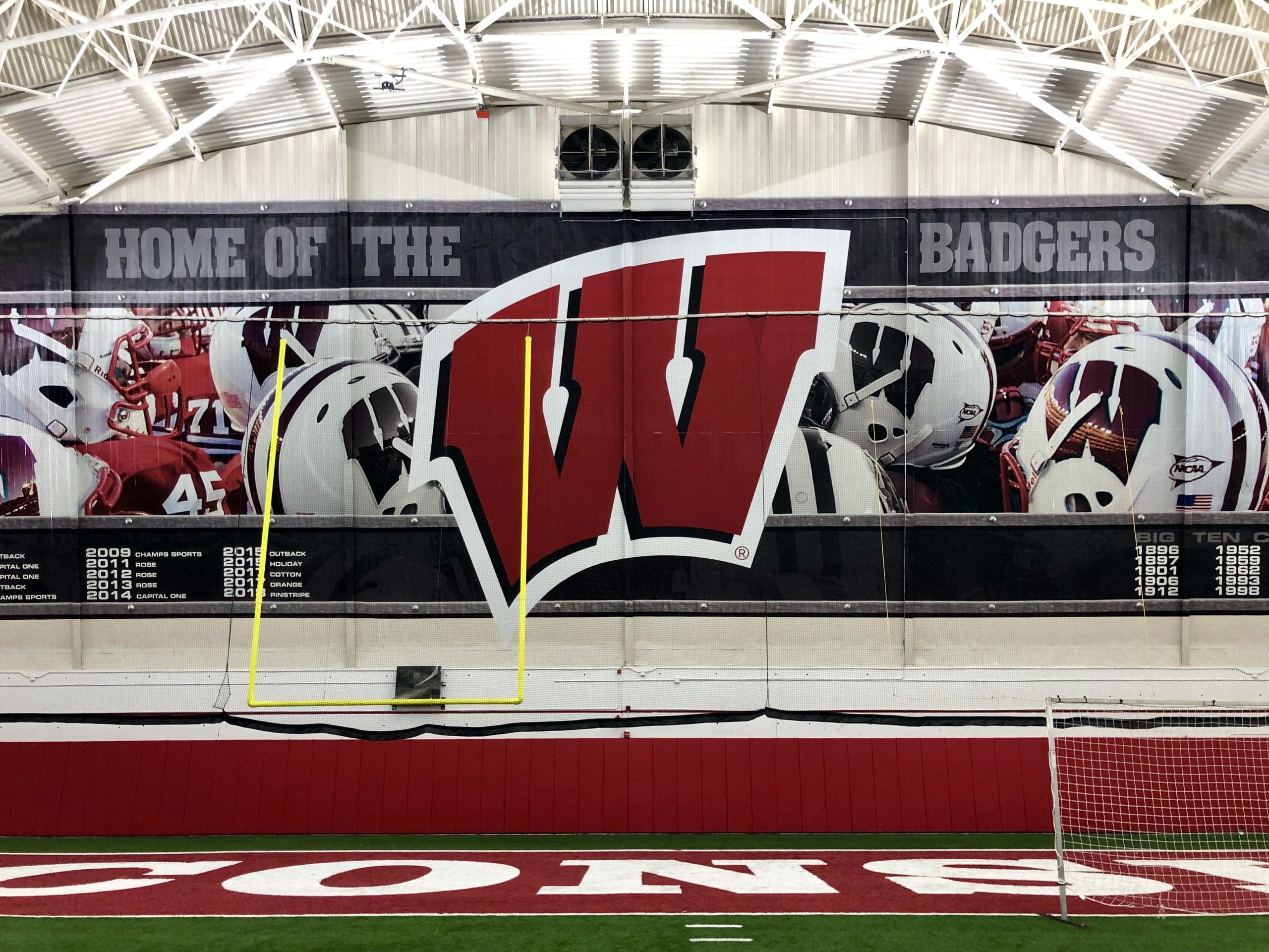 Wisconsin badgers Wall mural inside practice center with turf grass