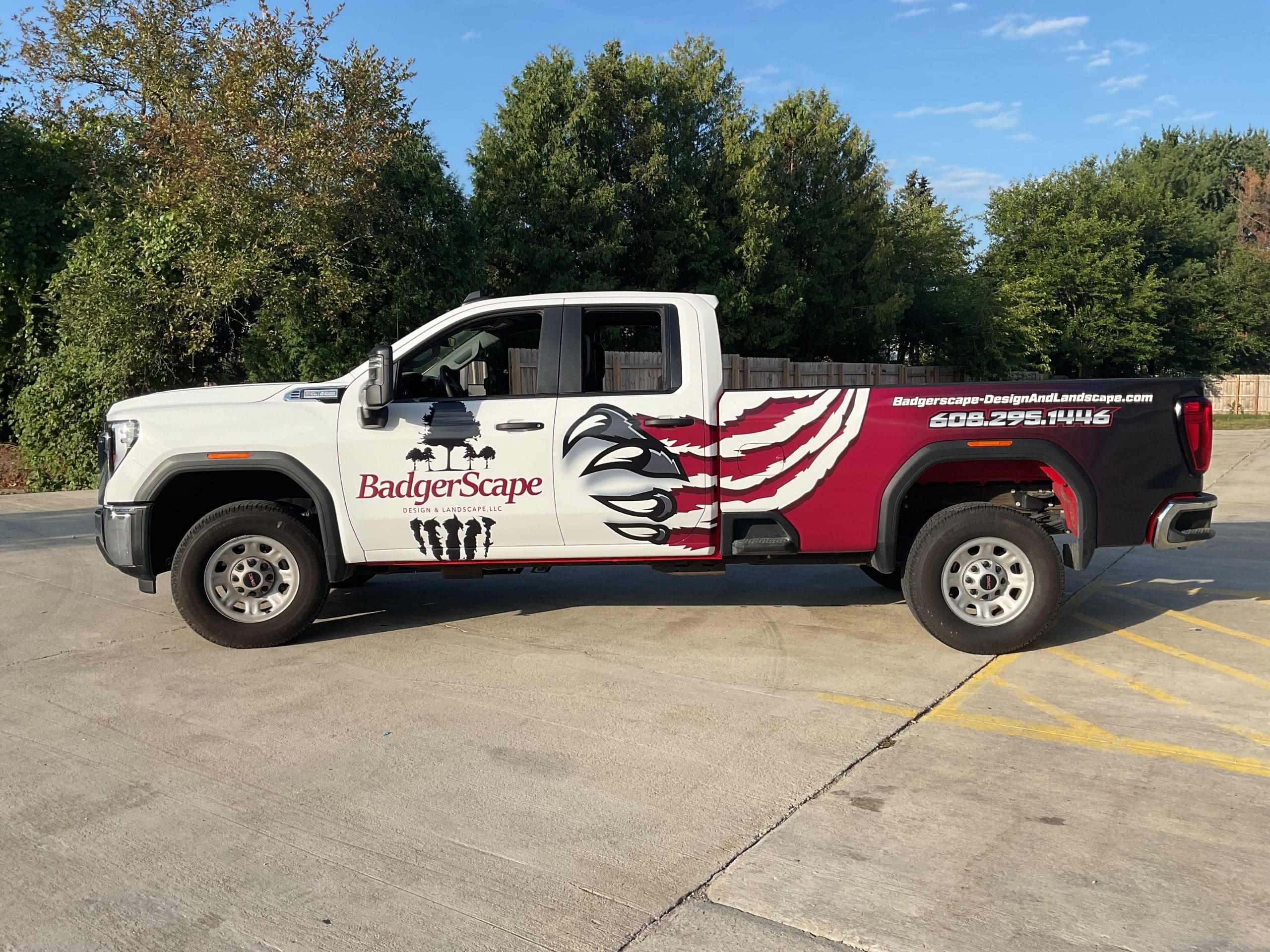 Badger Scape company truck with Fleet Graphics Vehicle wrap designed by Madison Graphics Company