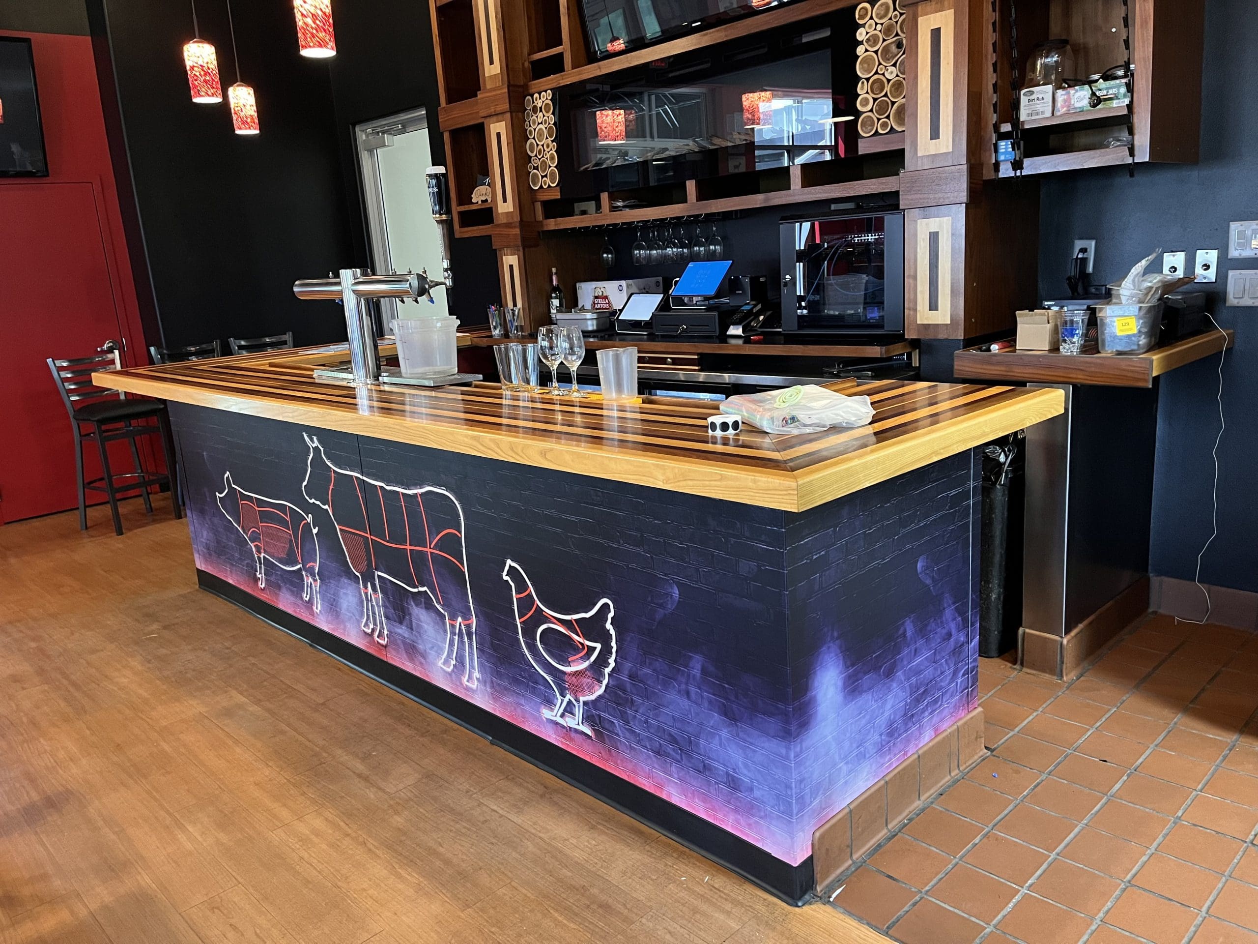 Graphics of animals on a table for a restaurant bar