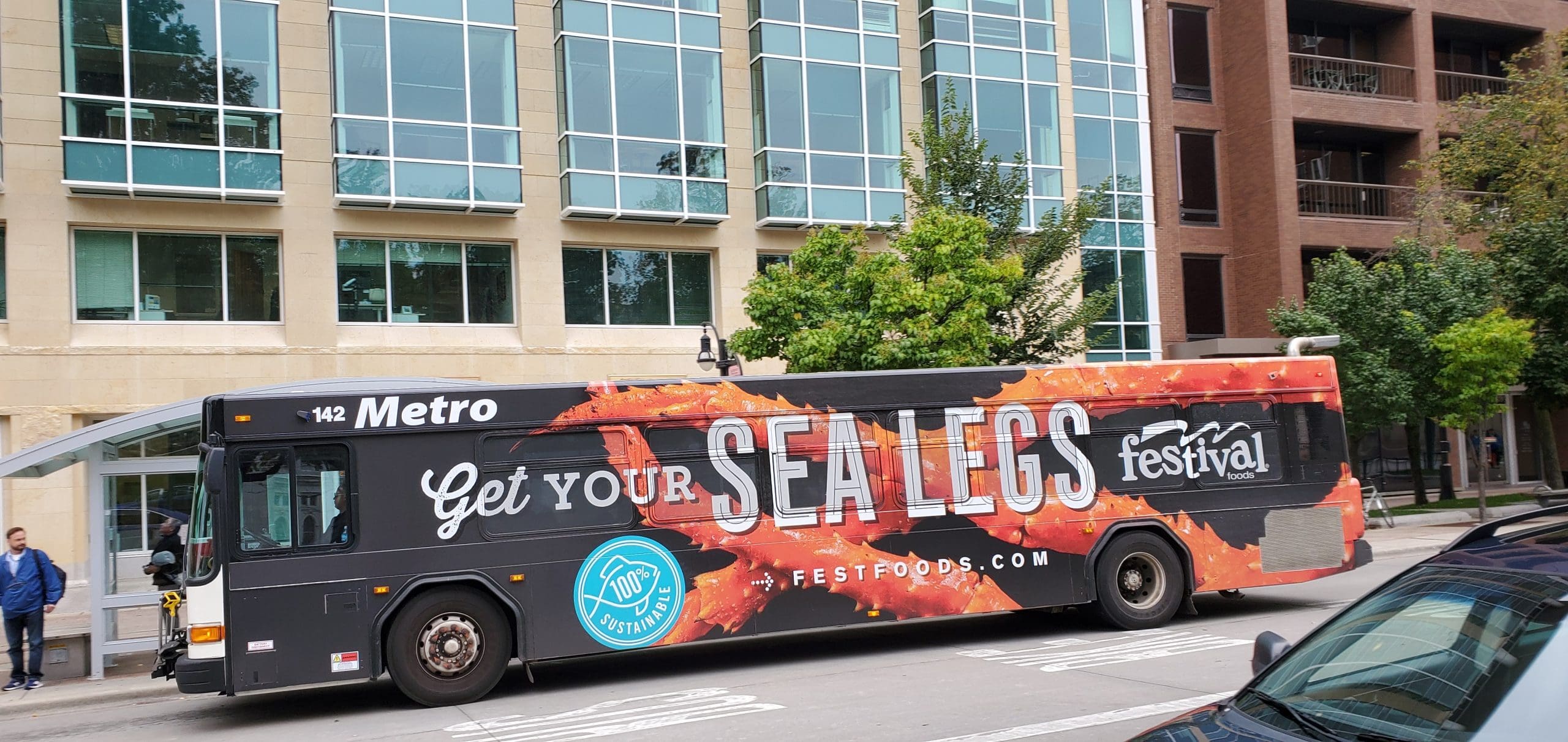 Get Yours Sea Legs Bus Fleet Graphics promoting Festival Foods Grocery mart