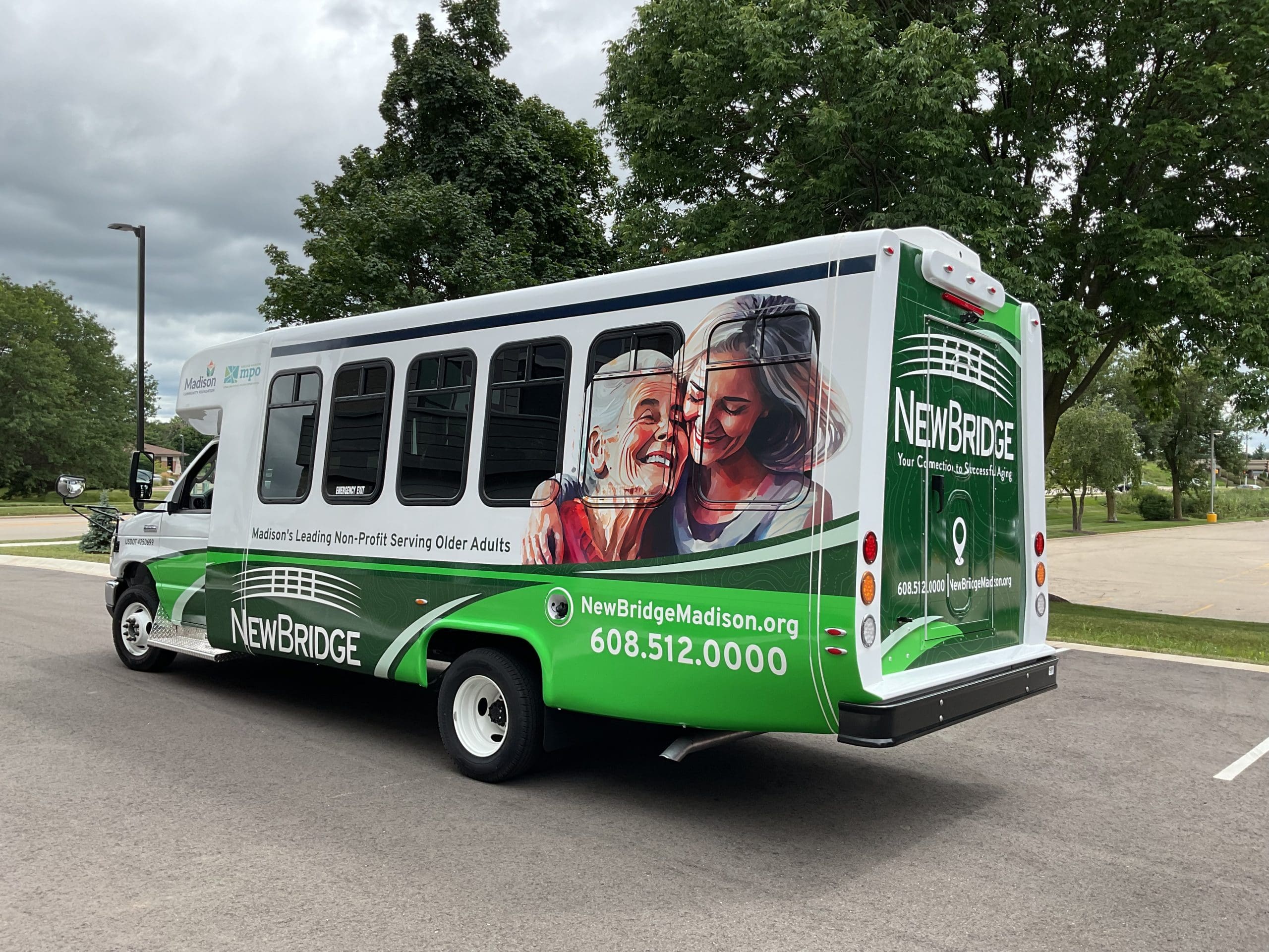 New Bridge bus with Fleet Graphics Vehicle wrap designed by Madison Graphics Company