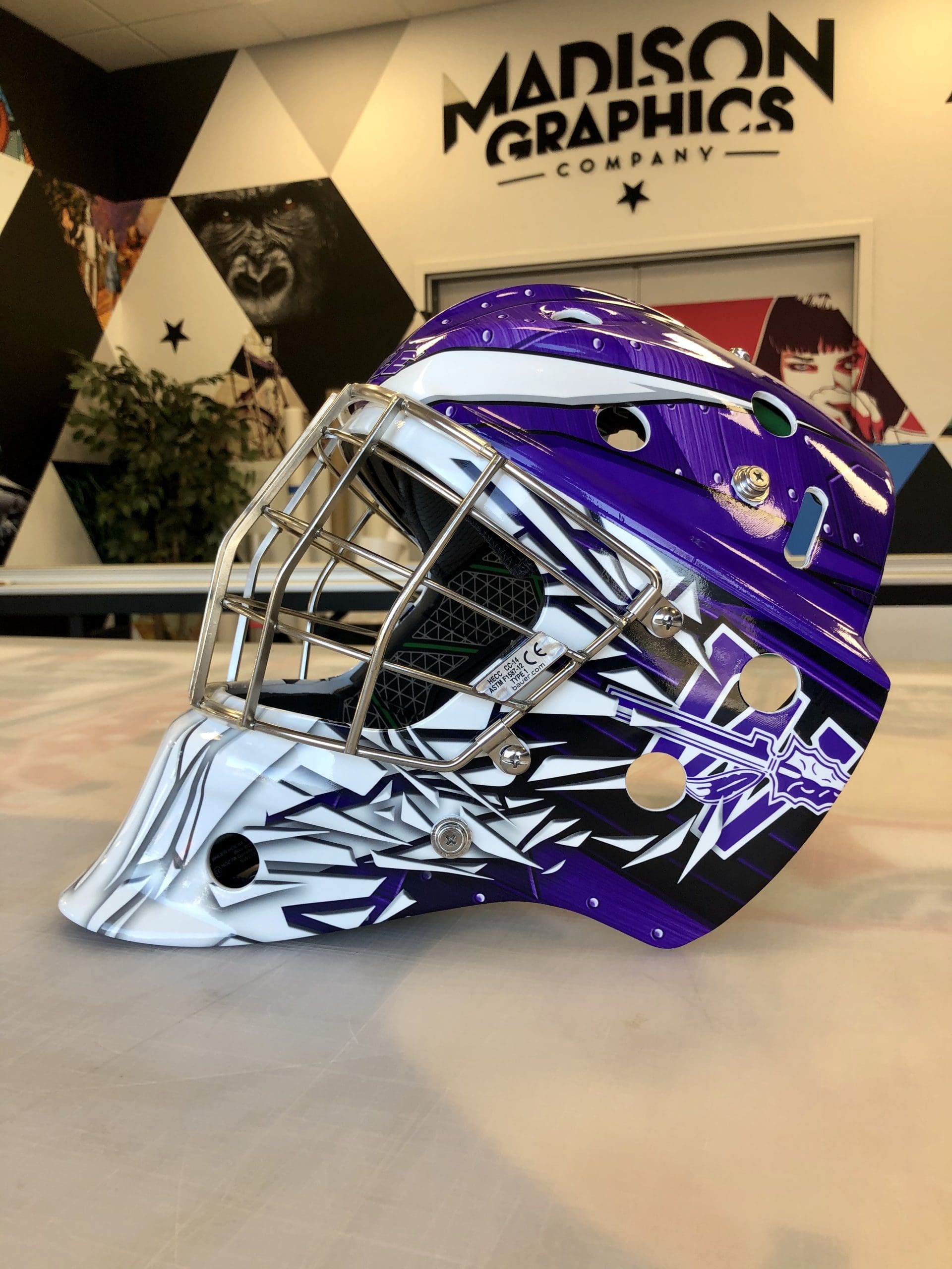 Purple sports team Graphics on helmet