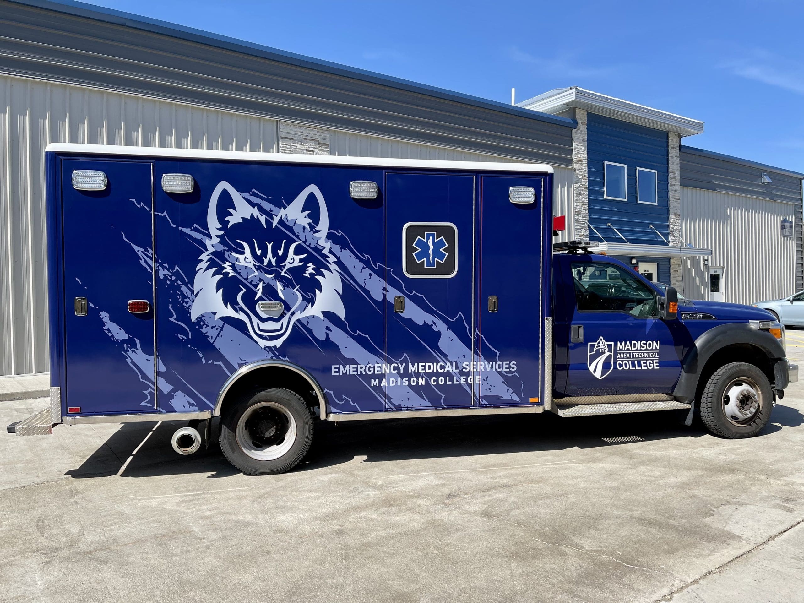 Madison Technical college Emergency Medical services ambulance with colorful Fleet Graphics Vehicle wrap designed by Madison Graphics Company