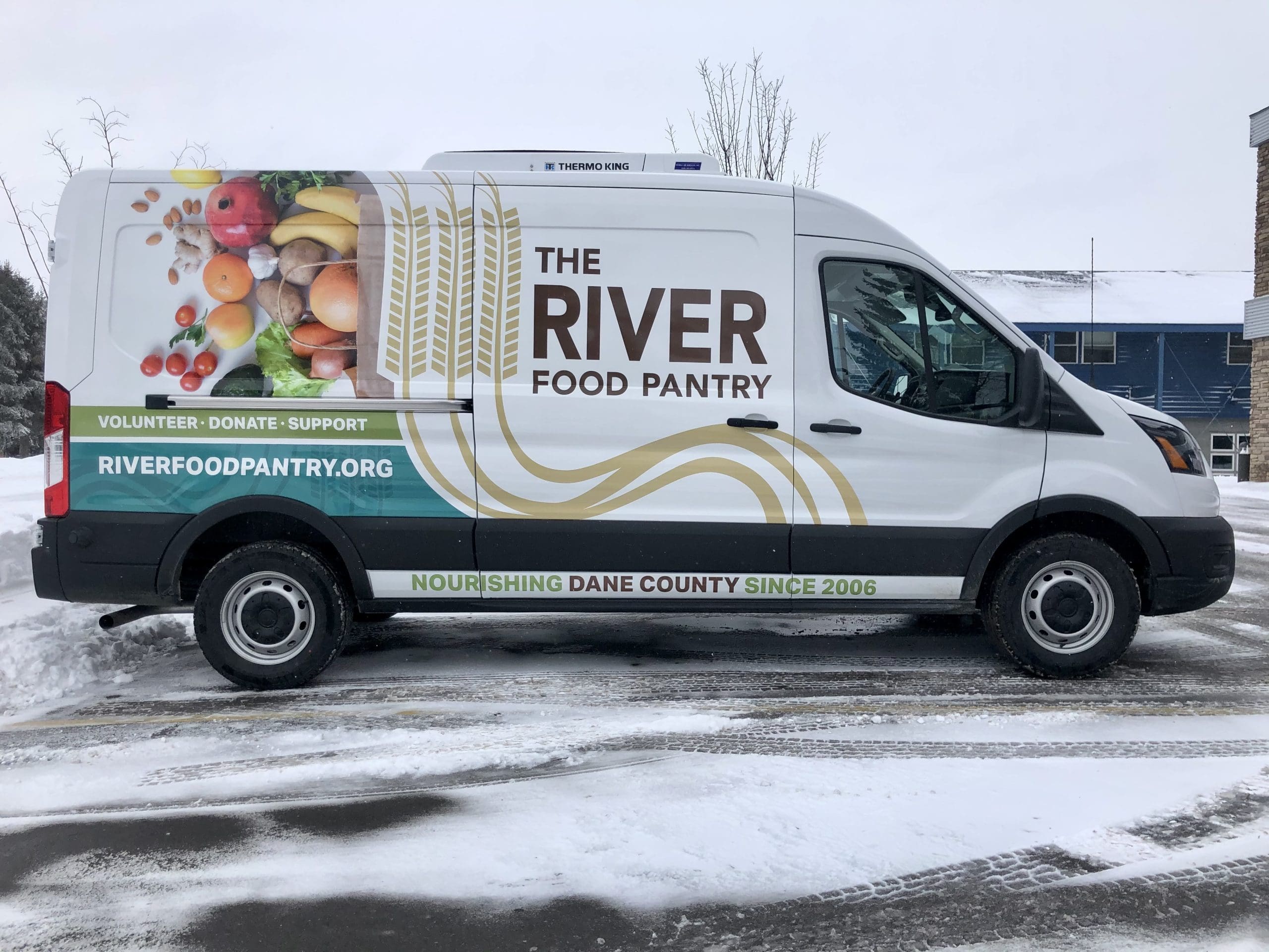 The river Food Pantry van with Fleet Graphics Vehicle wrap designed by Madison Graphics Company
