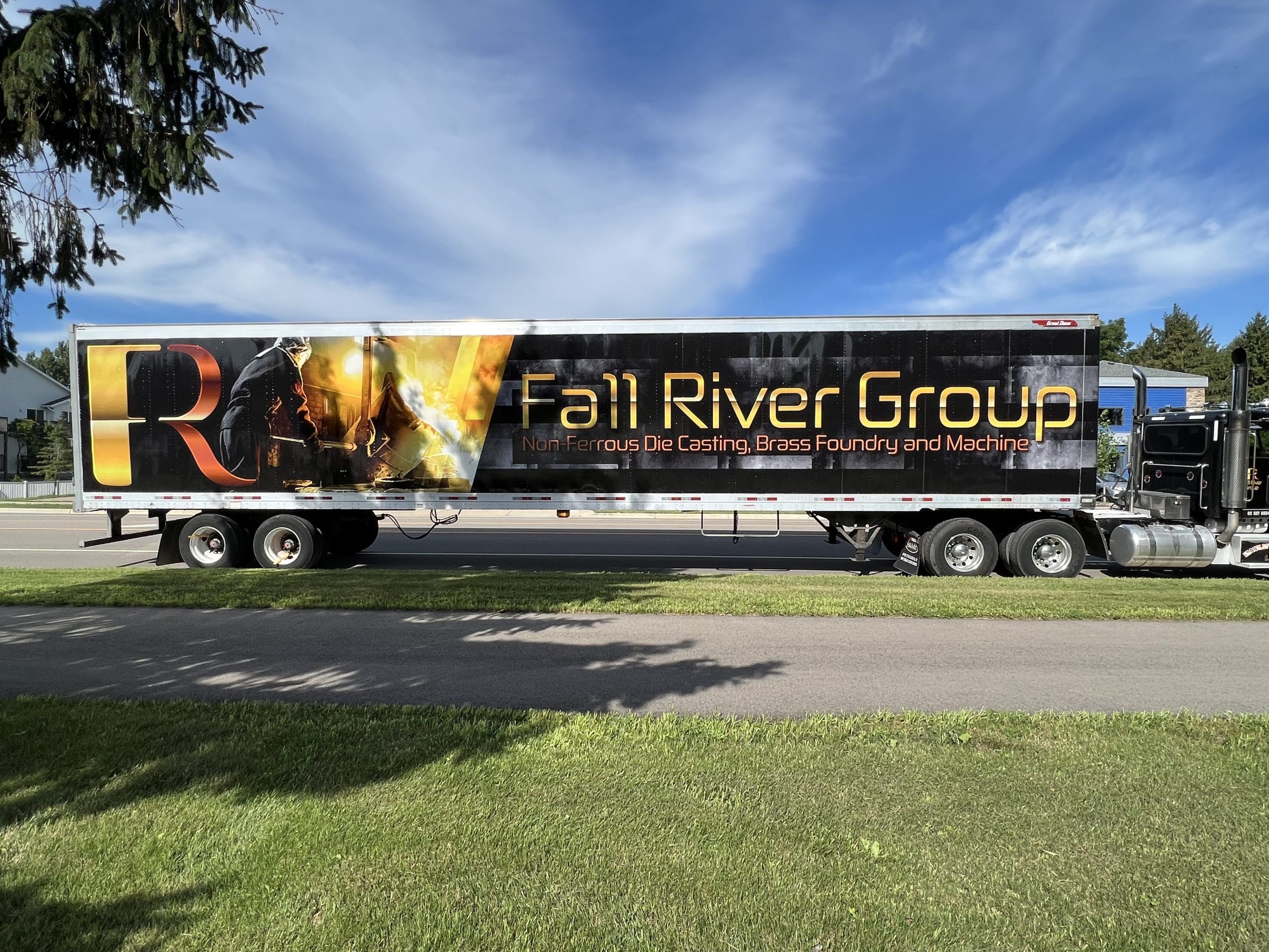 Fall River Group semi truck and trailer with Fleet Graphics Vehicle wrap designed by Madison Graphics Company